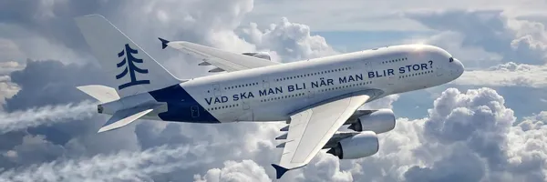En Airbus A380 i luften med en retorisk fråga tryckt på sidan: Vad ska man bli när man blir stor?