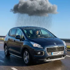 Jag i vår blå Peugeot, det är en klarblå himmel, men precis ovanför bilen är ett regnmoln som vräker ner regn på bilen.